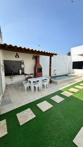 Casa Climatizada com Piscina e Área de Churrasco 400B